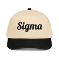 Trucker hat with beige crown, black front panel, and black SIGMA logo.