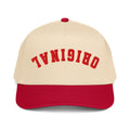 Natural-and-red trucker hat with red 'TVN01918' front graphic