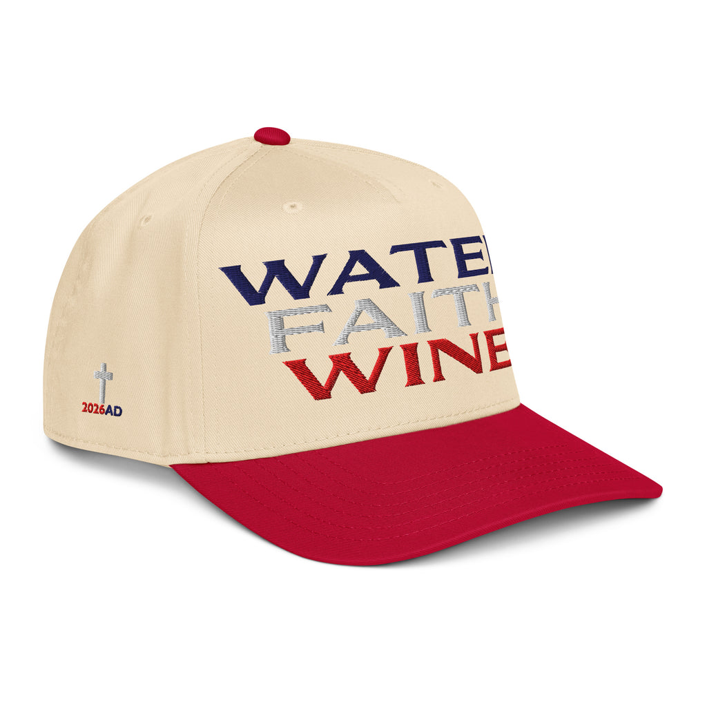 Two-tone trucker hat with Water Faith Wine front text; natural crown, red brim, angled view.