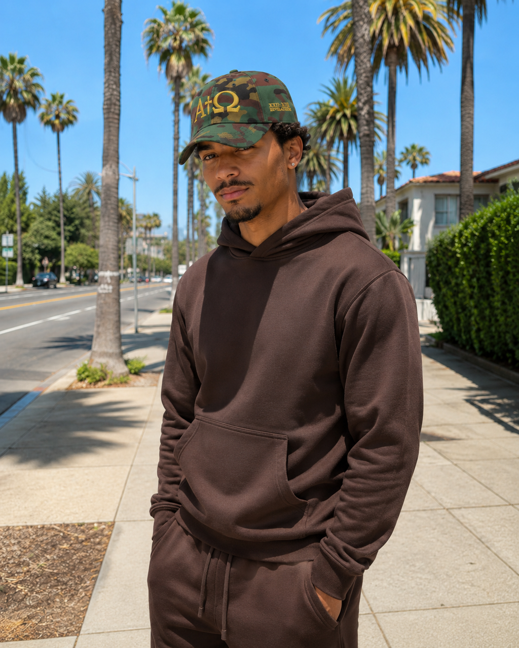 ALPHA + OMEGA™ dad hat in green camo with gold logo